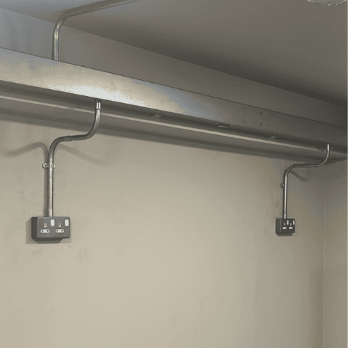 Surface conduit and double socket installation in garage, Dublin electrician